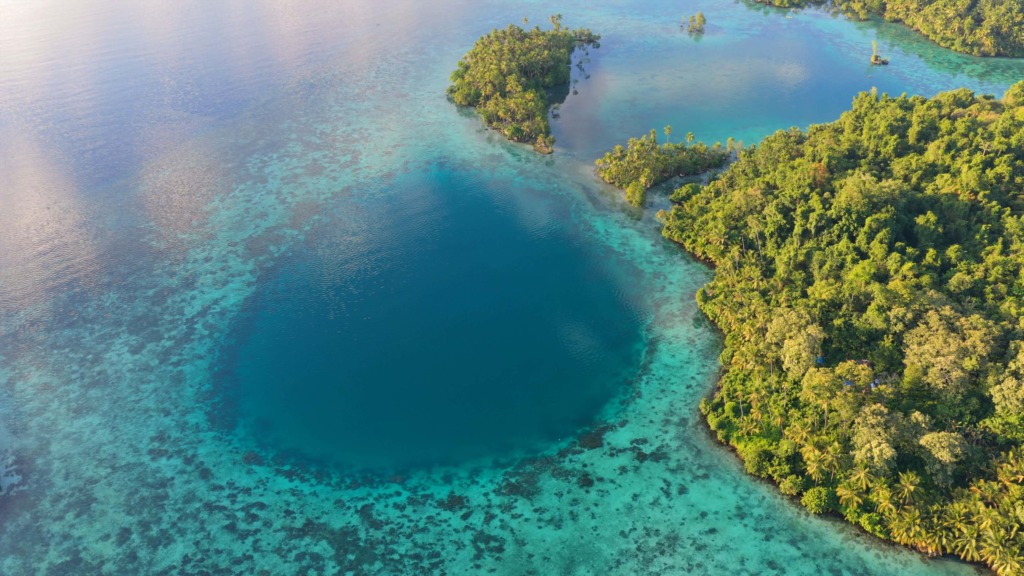Aerial view of clear blue water near Luk Panenteng