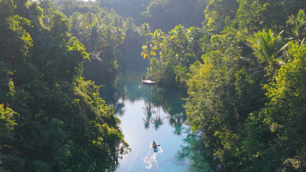 Aerial view of visitors exploring Paisu Pok Lake