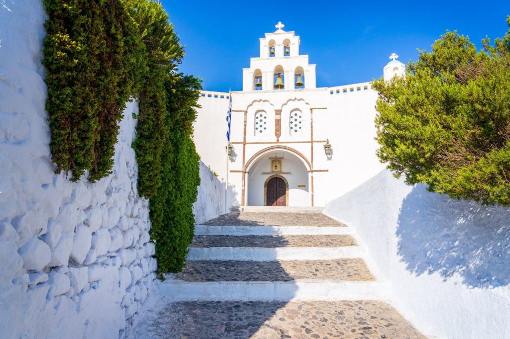 Pyrgos church entrance with stone steps, Santorini, Greece