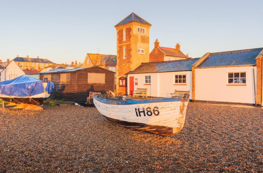 Aldeburgh Lifeboat House on the beach in the golden sunrise light