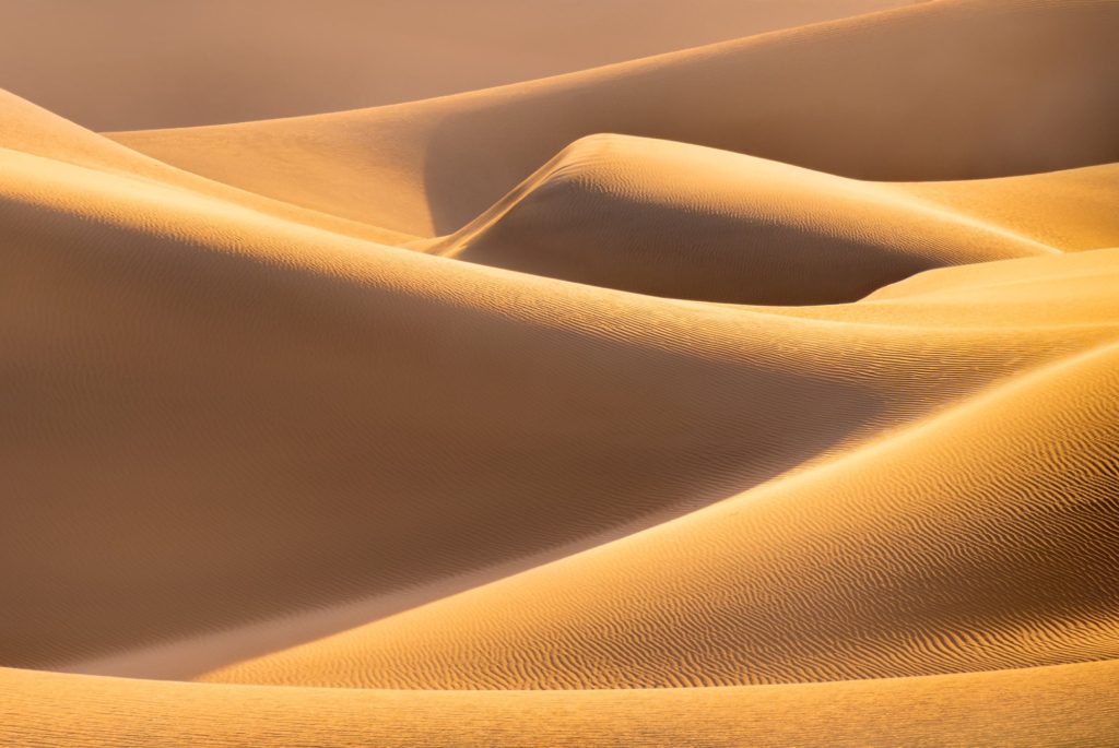 Golden sand dunes at sunset, Death Valley, USA