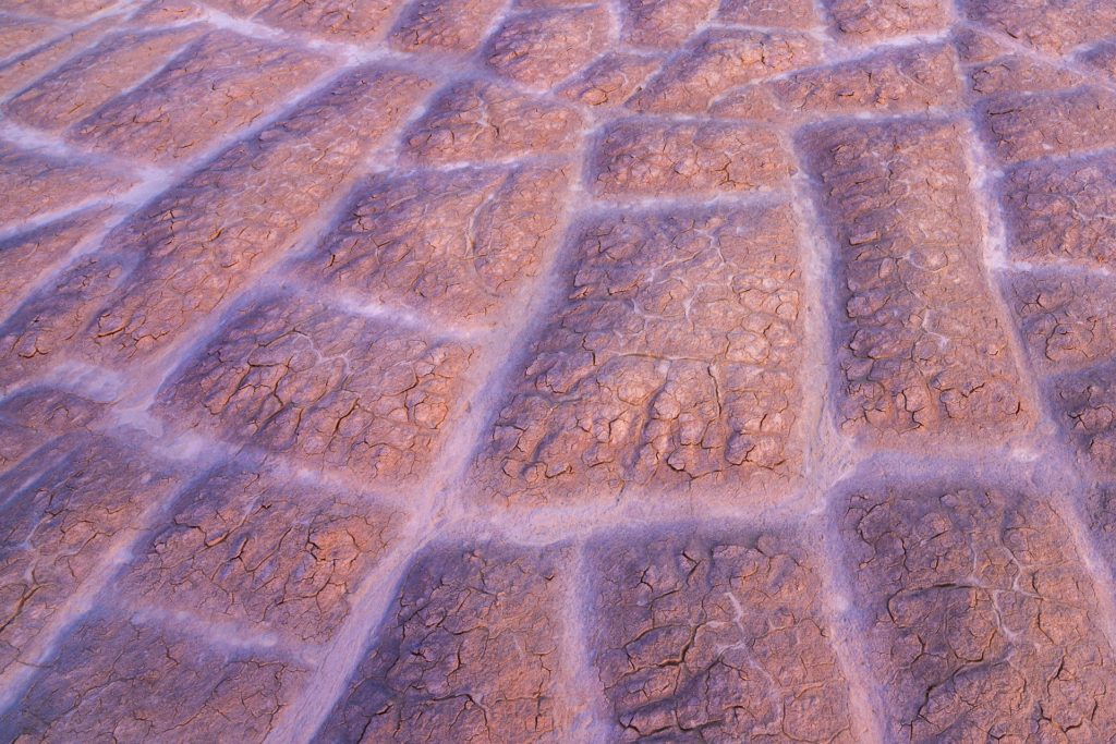 Mud patterns in Death Valley, California, showcasing textured earth formations
