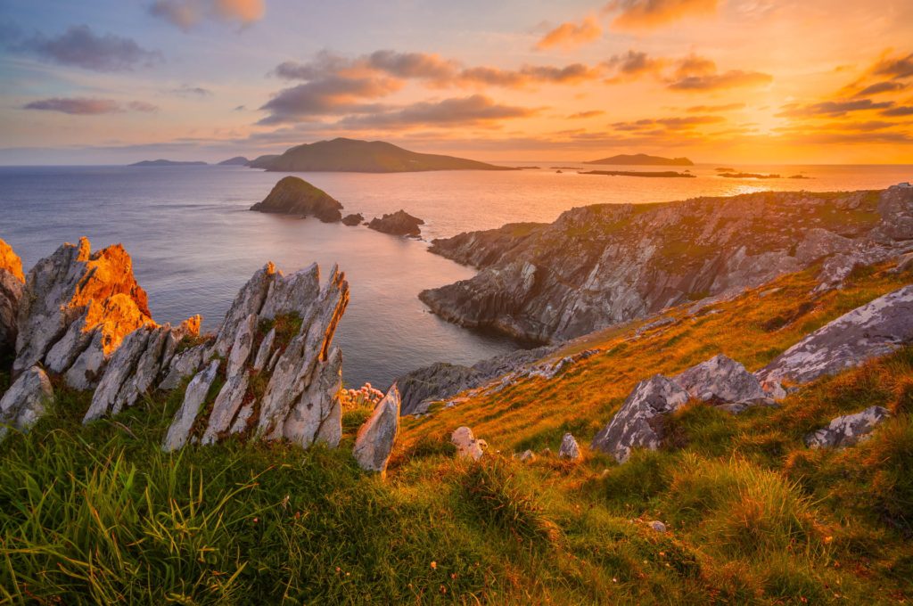 Sunset over rocky coastline at Dunmore Head, Ireland