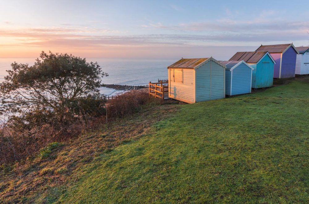 Beach huts on the cliffs at Felixstowe at sunrise