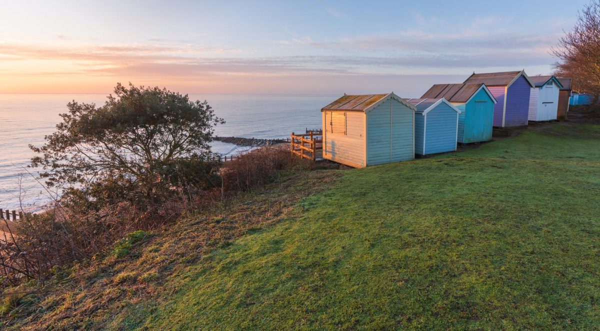 Beach huts on the cliffs at Felixstowe at sunrise
