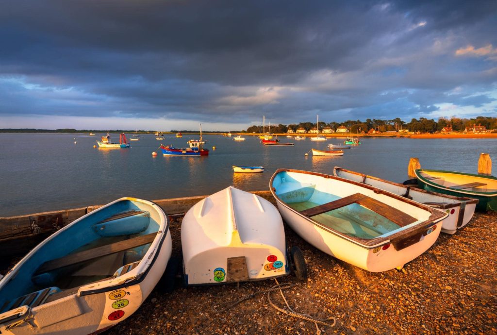 Dramatic clouds over boats at Felixstowe Ferry, Suffolk, England