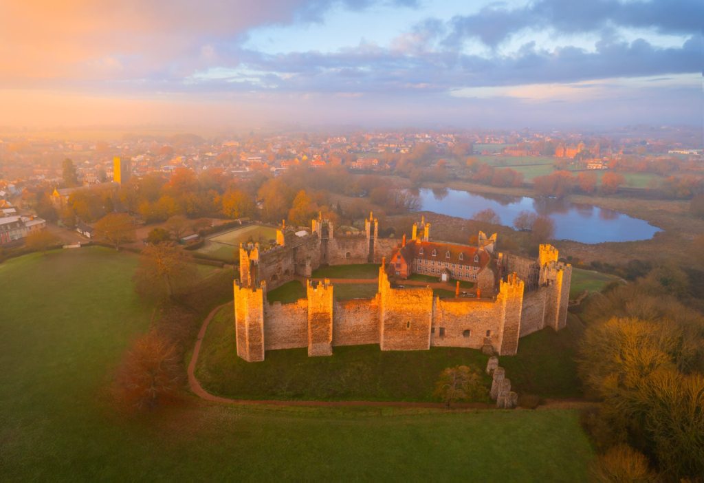 Aerial view of Framlingham Castle surrounded by mist, Suffolk, England