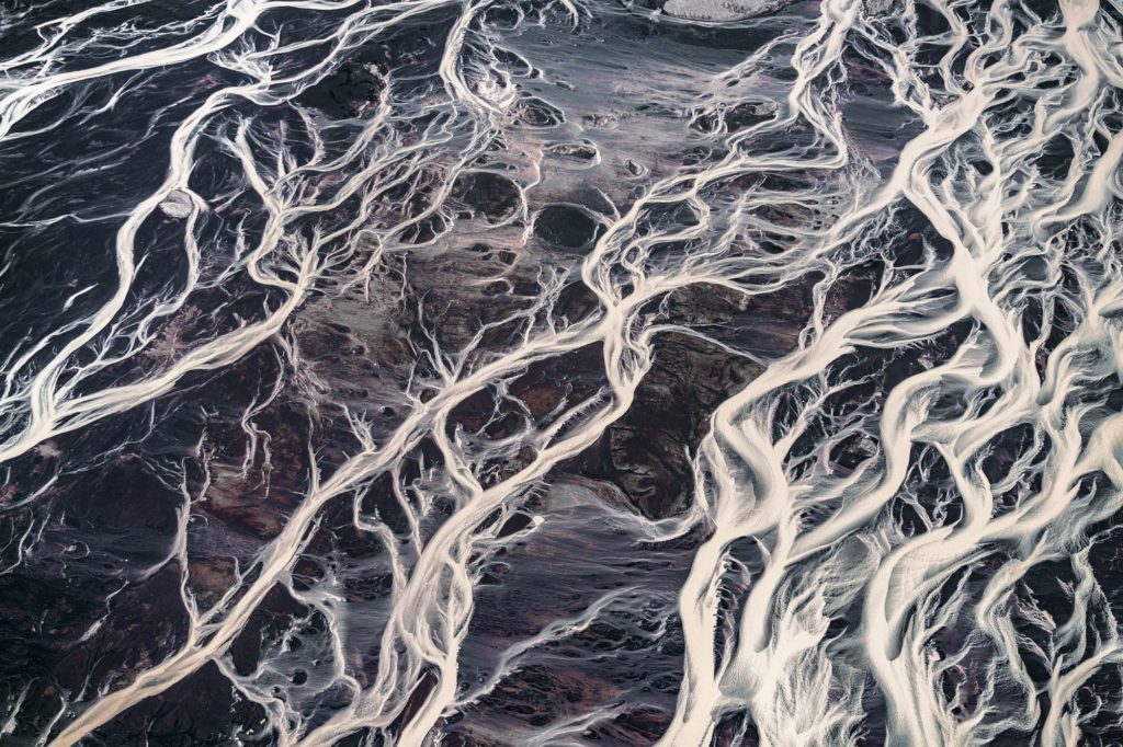 Intricate glacier rivers meandering across Iceland's rugged landscape