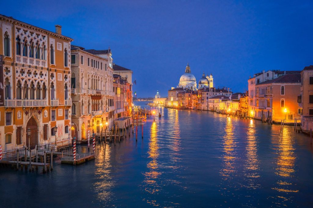 Blue hour over the Grand Canal, Venice, Italy with illuminated buildings
