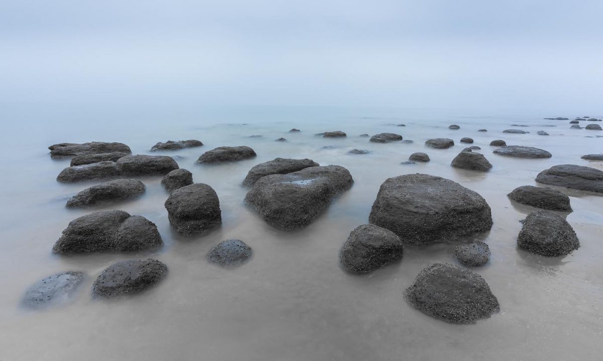 Rocks on Hunstanton beach, Norfolk, at Hunstanton revealing themselves as the tide recedes