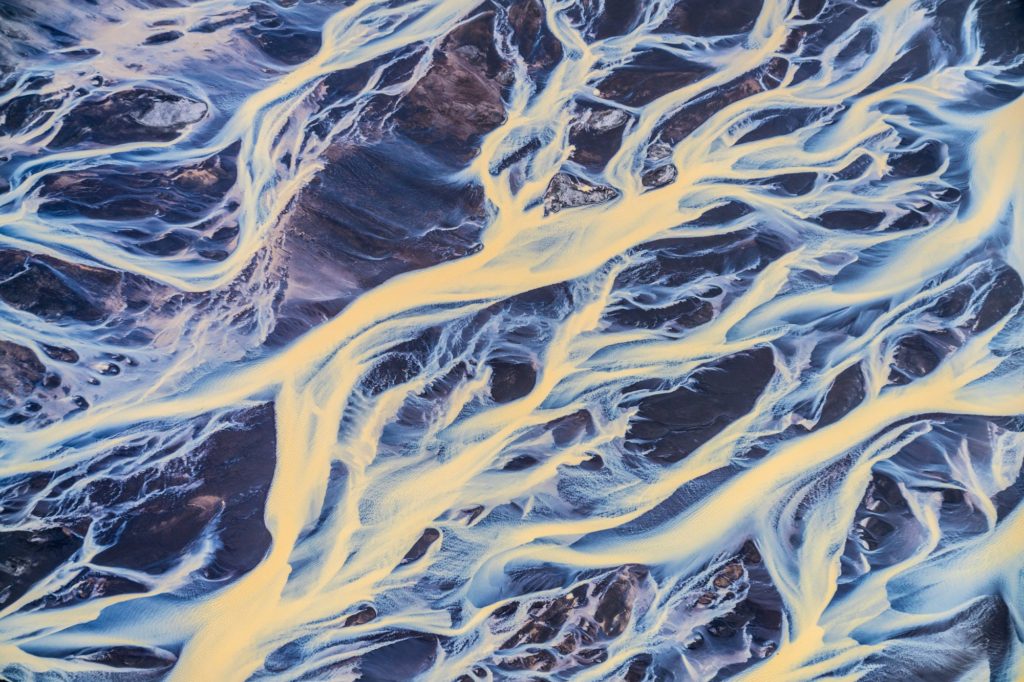 Glacier river braids in shades of blue, Iceland