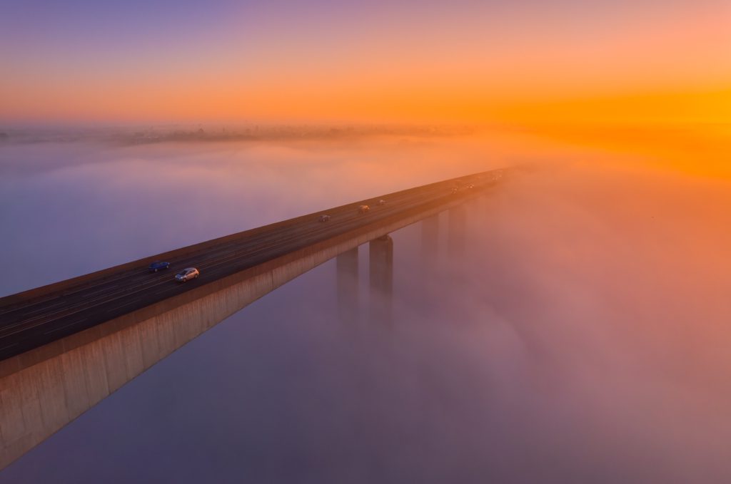 Orwell Bridge at sunrise above fog, River Orwell, Suffolk, England
