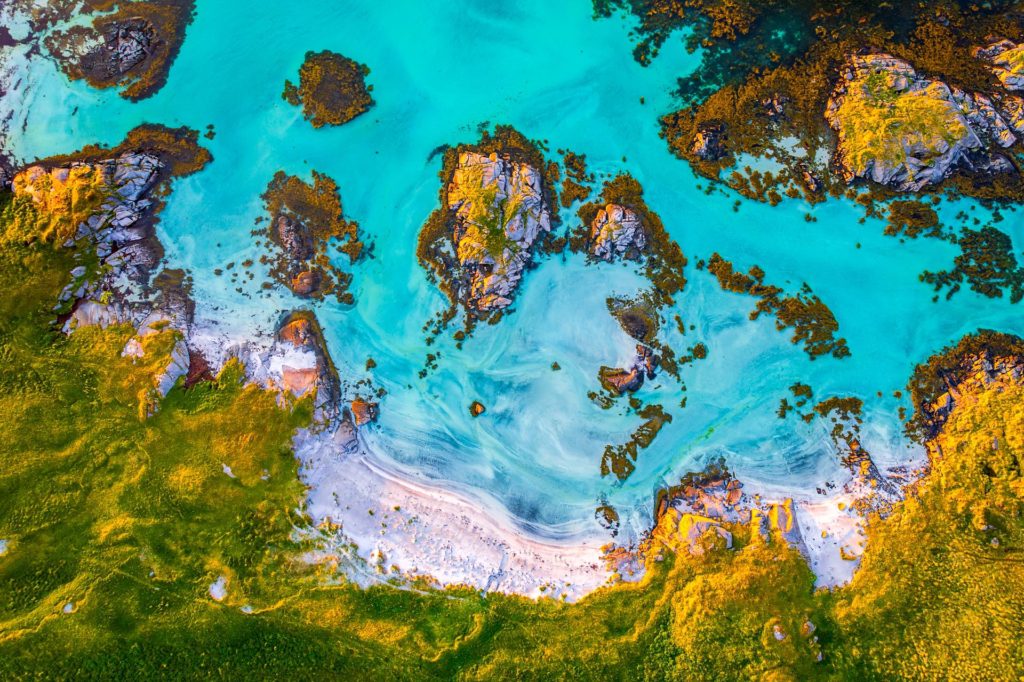 Turquoise ocean and rocky islands in summer, Lofoten, Norway