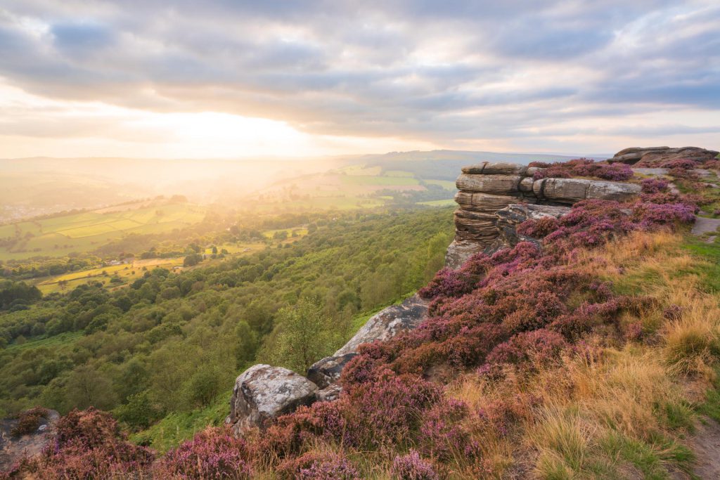 Dramatic sunset light over Curbar Edge, Peak District, England