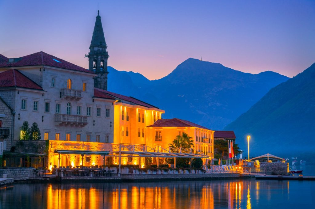 Perast waterfront buildings illuminated at blue hour, Montenegro