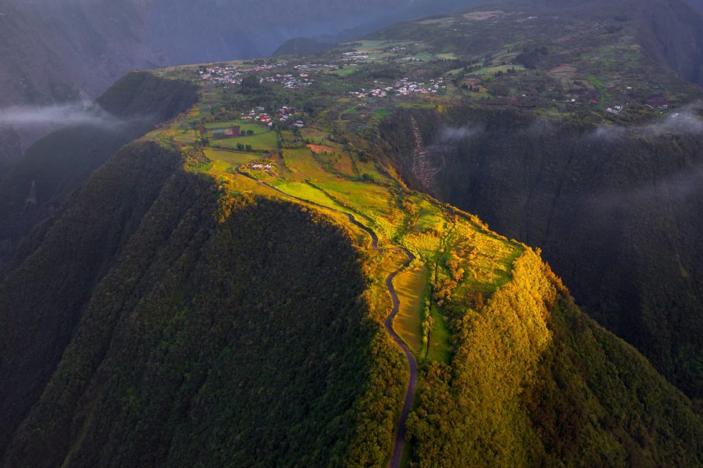Mountain communities on a green ridge in Réunion, France