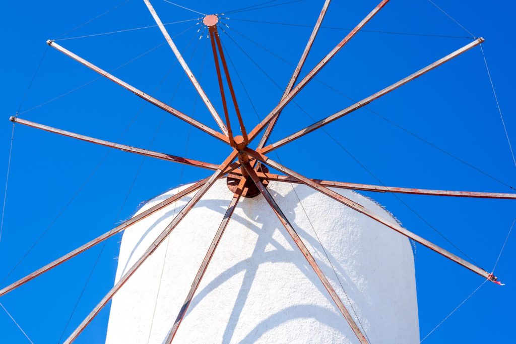 Detail of windmill structure against a clear blue sky, Santorini, Greece
