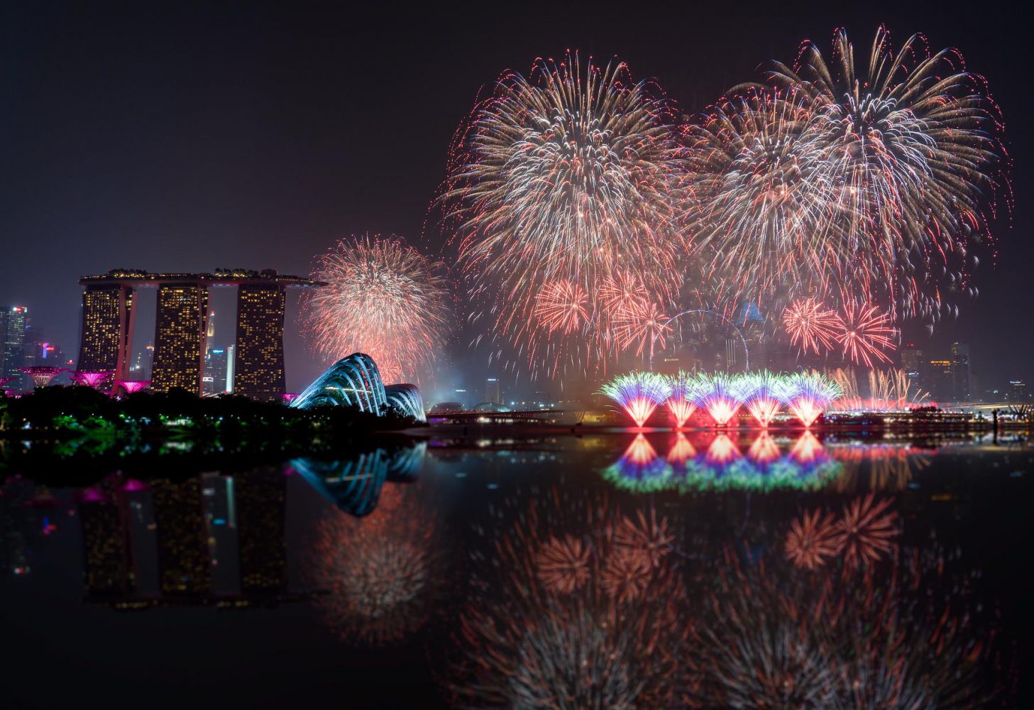 Spectacular fireworks display in Singapore, view from the Gardens by the Bay looking across the city skyline