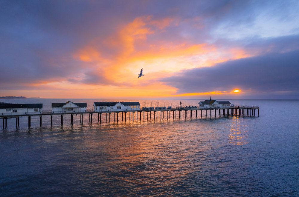 Southwold Pier with a beautiful sunrise from a drone