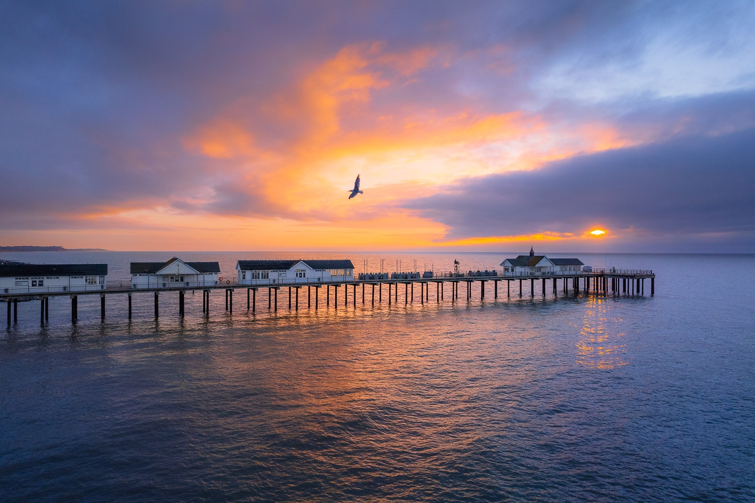 Southwold Pier with a beautiful sunrise from a drone
