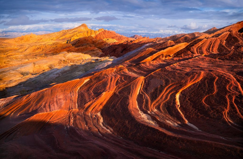 Sunset over the wavy red rock formations, Valley of Fire, Nevada, USA